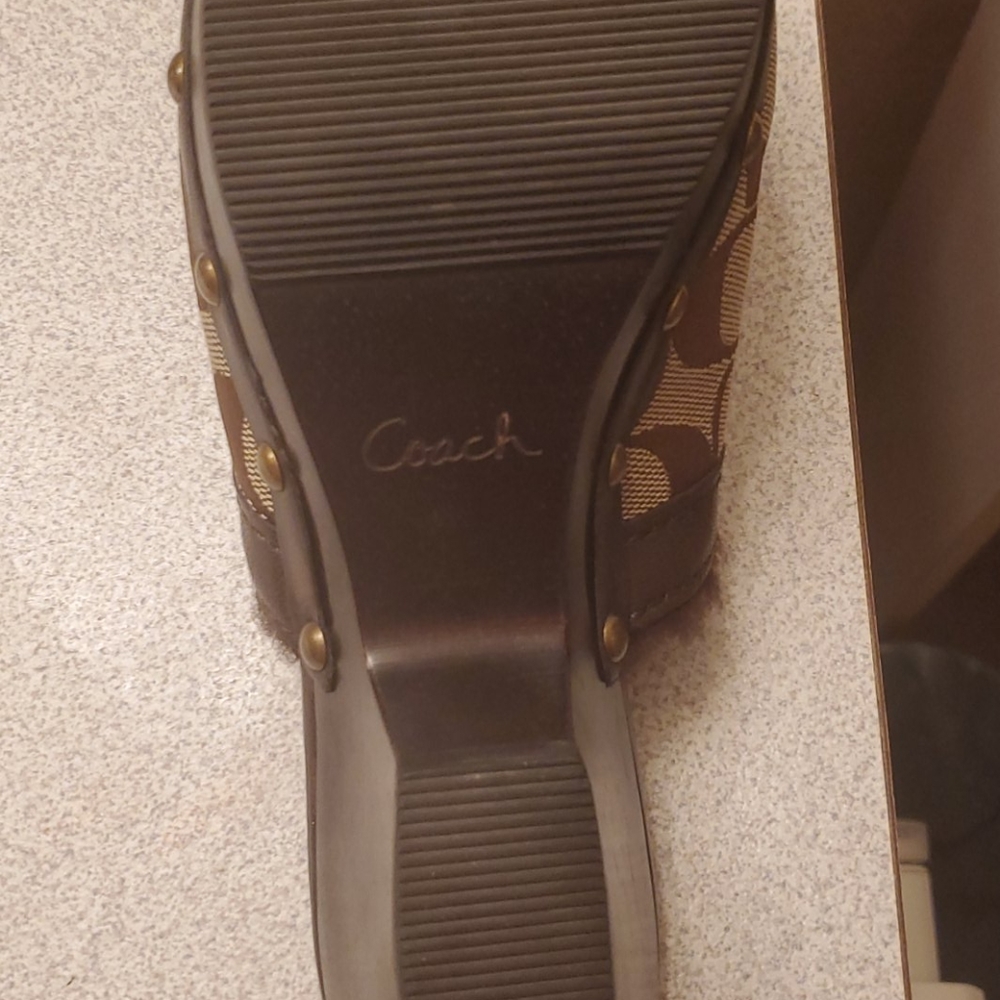 Authentic Lightly fur lined COACH healed shoes.
